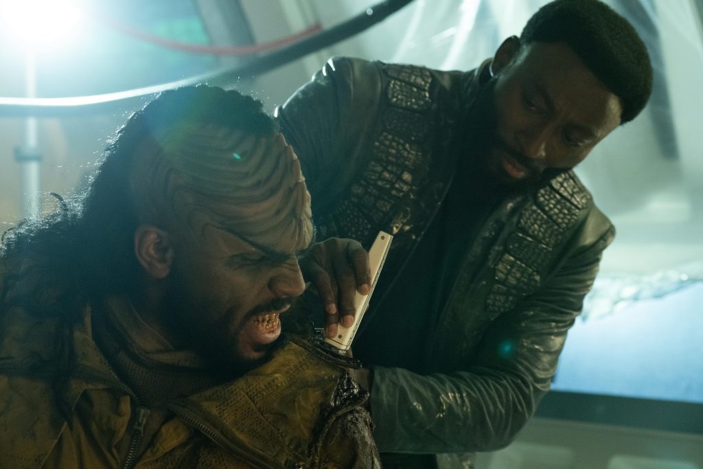 Abbas Wahab as Ror’Queg and Babs Olusanmokun as M'Benga appearing in episode 1 The Broken Circle Strange New Worlds