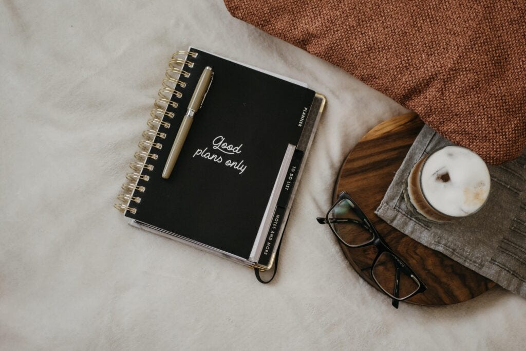 set goals and action steps to get out of a rut